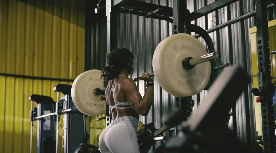 Woman lifting weights background image